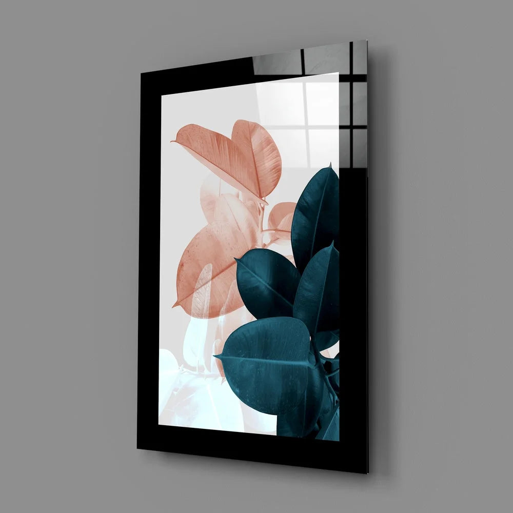 Modern botanical glass wall art with black-framed peach and teal leaves