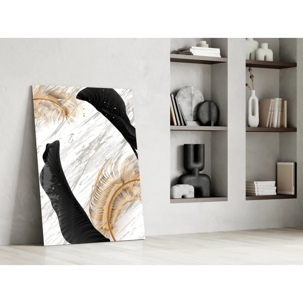 Modern black and gold feather glass wall art on white marble