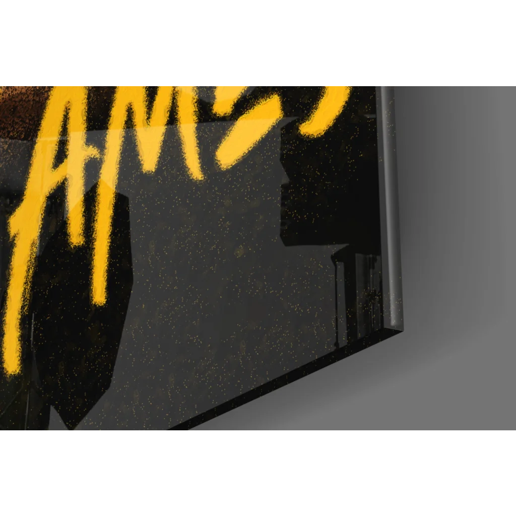 Black framed glass wall art poster with bold yellow graffiti lettering