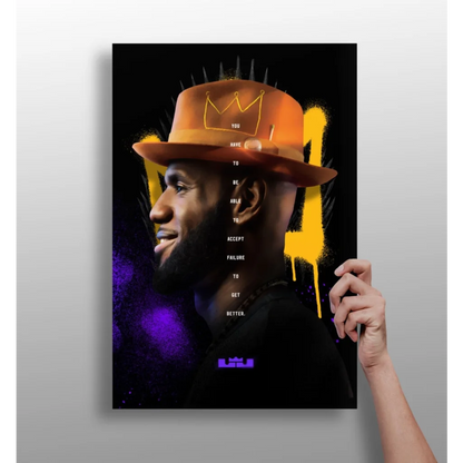 LeBron James orange crown hat with spikes on black background