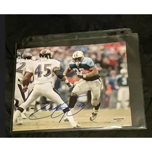 Lendale White autographed 8x10 photo of football players in action for collection