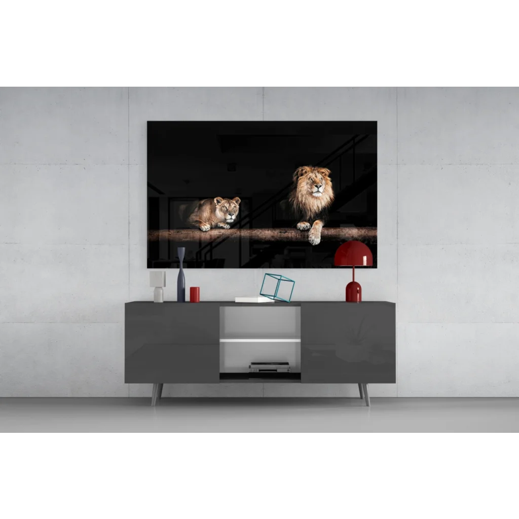 Majestic lion pair in black-framed glass wall art on branch
