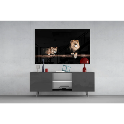 Majestic lion pair in black-framed glass wall art on branch