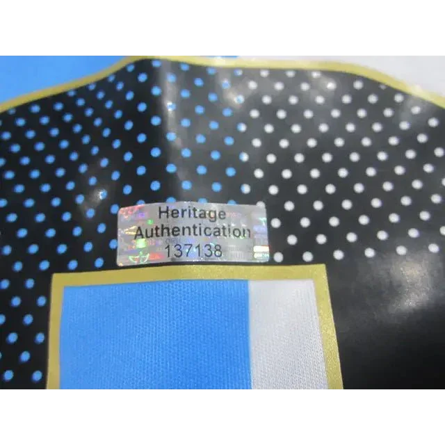Holographic Heritage Authentication sticker on Leo Lionel Messi signed jersey collectible