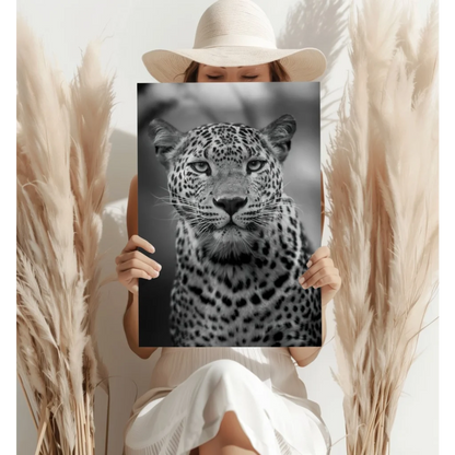 Person holding black and white leopard portrait on insigne aluminum print