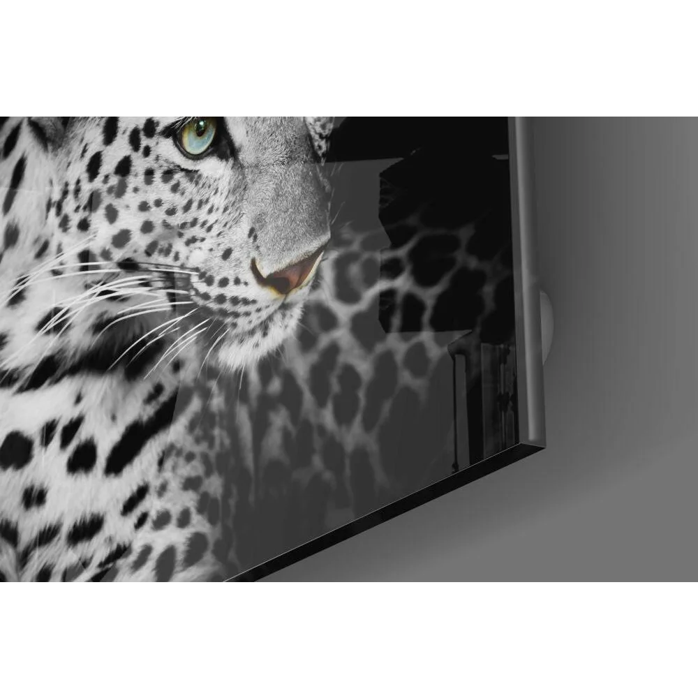 Stunning leopard glass wall art with piercing green eyes