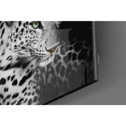 Stunning leopard glass wall art with piercing green eyes