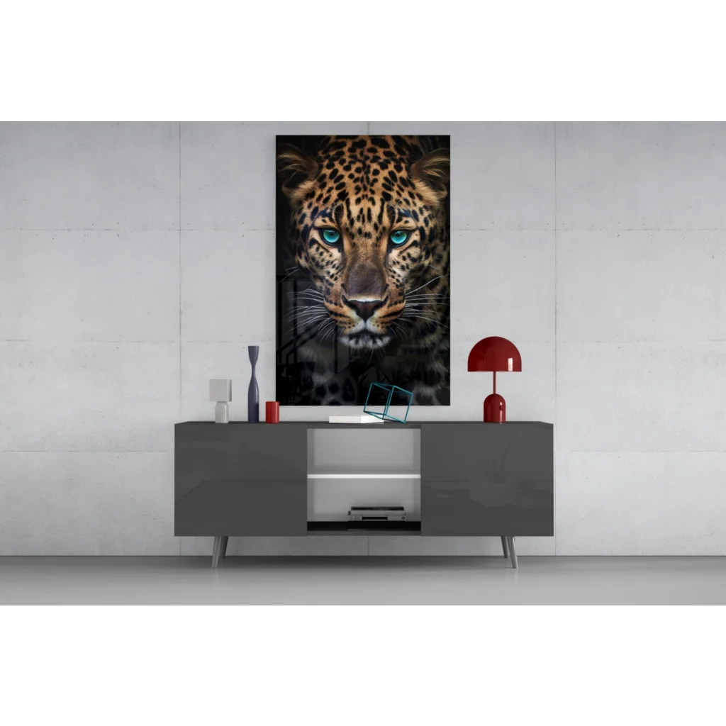 Stunning black-and-gold leopard glass wall art with blue eyes