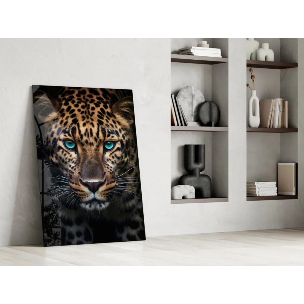 Stunning leopard glass wall art with piercing blue eyes in modern interior