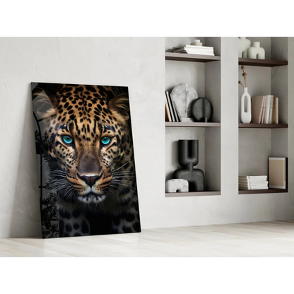 Stunning leopard glass wall art with piercing blue eyes in modern interior