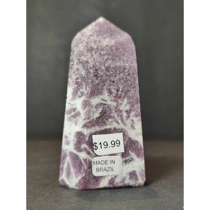 Purple and white lepidolite polished obelisk tower sculpture with a pointed tapered shape for display or decor