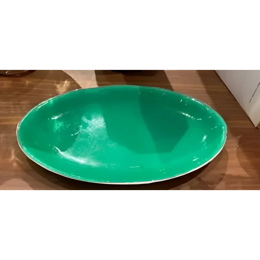 Green oval serving plate from Les Ottoman Murano for stylish Ottoman Murano serving dinners