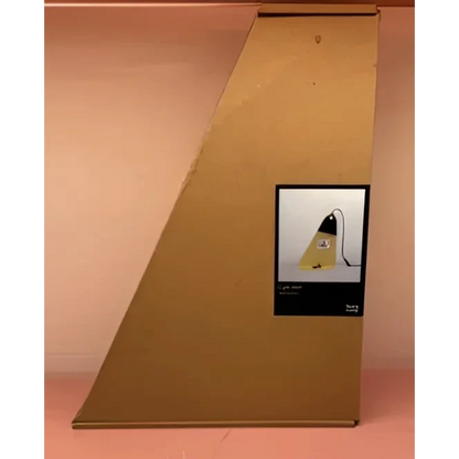 Cardboard box with yellow cheese-shaped night light for Light Shelf Black decor