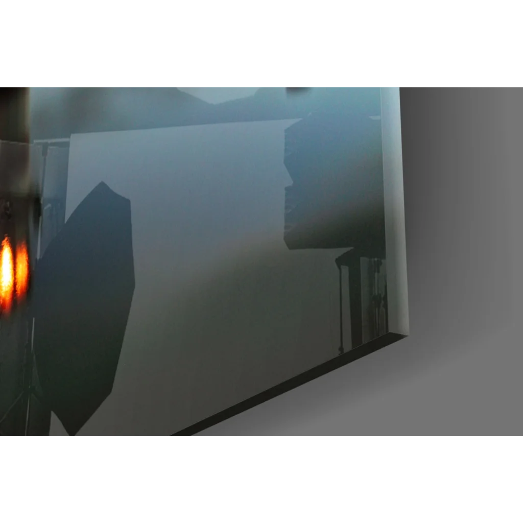 Sleek white-framed glass wall art reflecting studio lighting