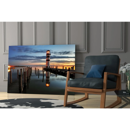 Serene lighthouse sunset glass wall art canvas print on pier