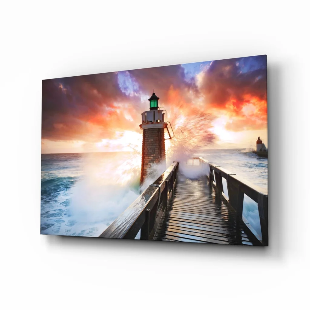 Vibrant lighthouse sunset glass wall art with crashing waves