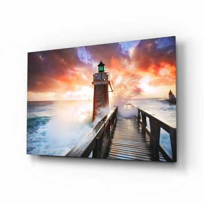 Vibrant lighthouse sunset glass wall art with crashing waves