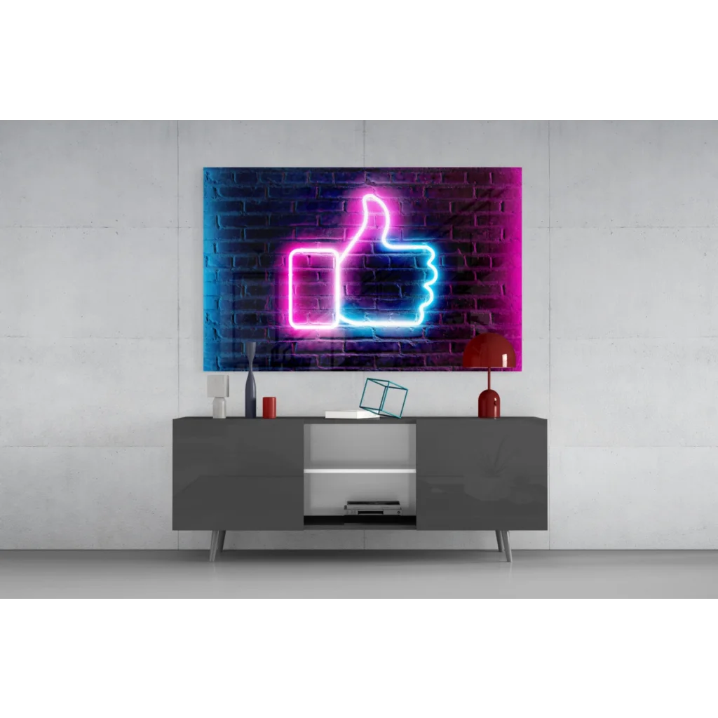 Vibrant pink blue neon thumbs up glass wall art on brick wall