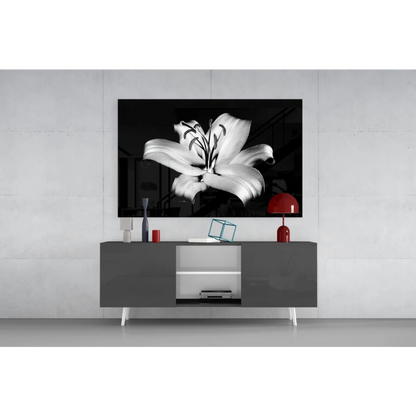 Stylized black-and-white lily wall art print with dramatic lighting