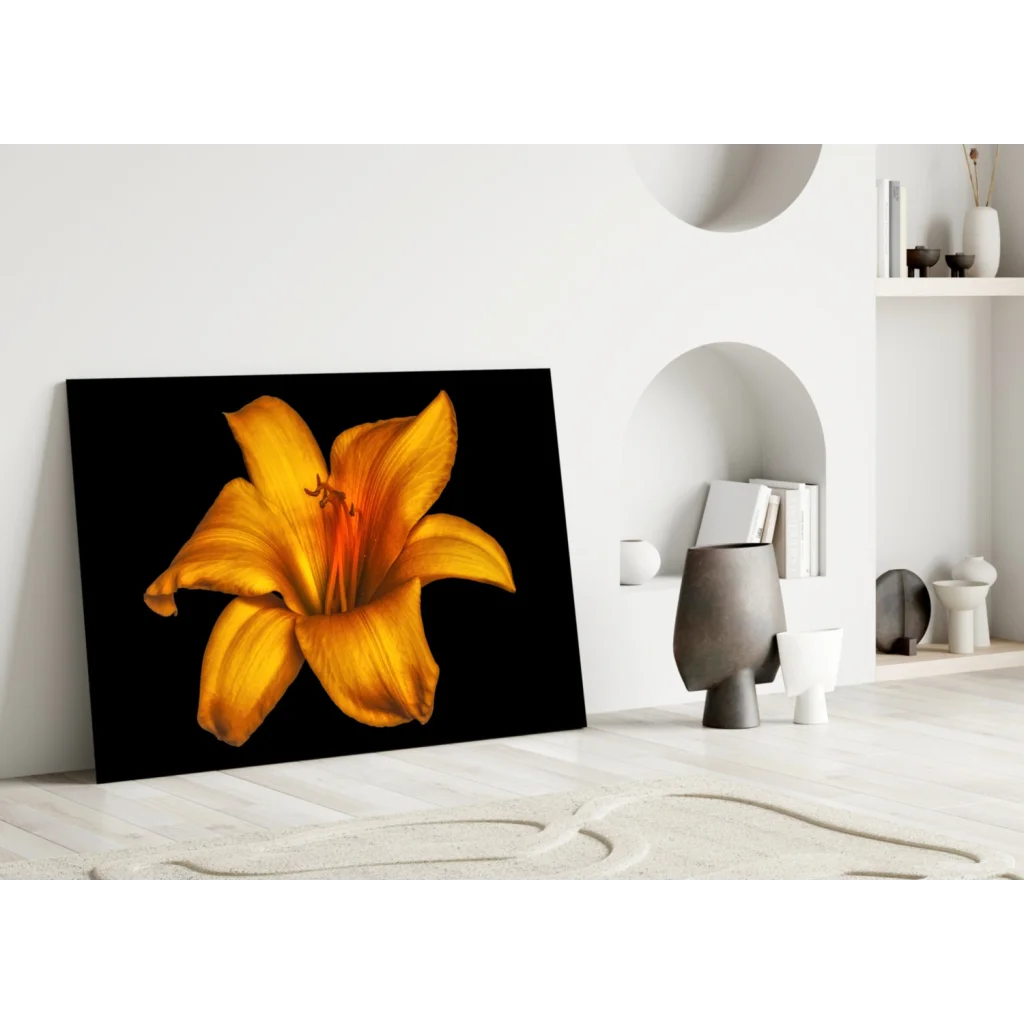 Vibrant yellow lily glass wall art on black canvas
