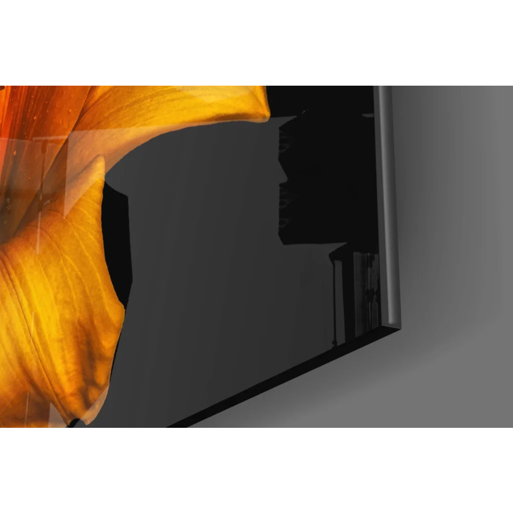 Sleek black TV displaying vibrant yellow lily glass wall art