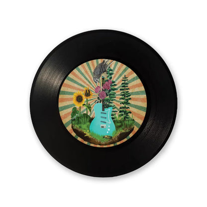Black vinyl record with colorful cover art featuring a turquoise guitar for Melissa Etheridge