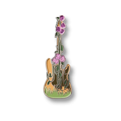 Decorative enamel pin of Melissa Etheridge cover art guitar with pink roses and greenery
