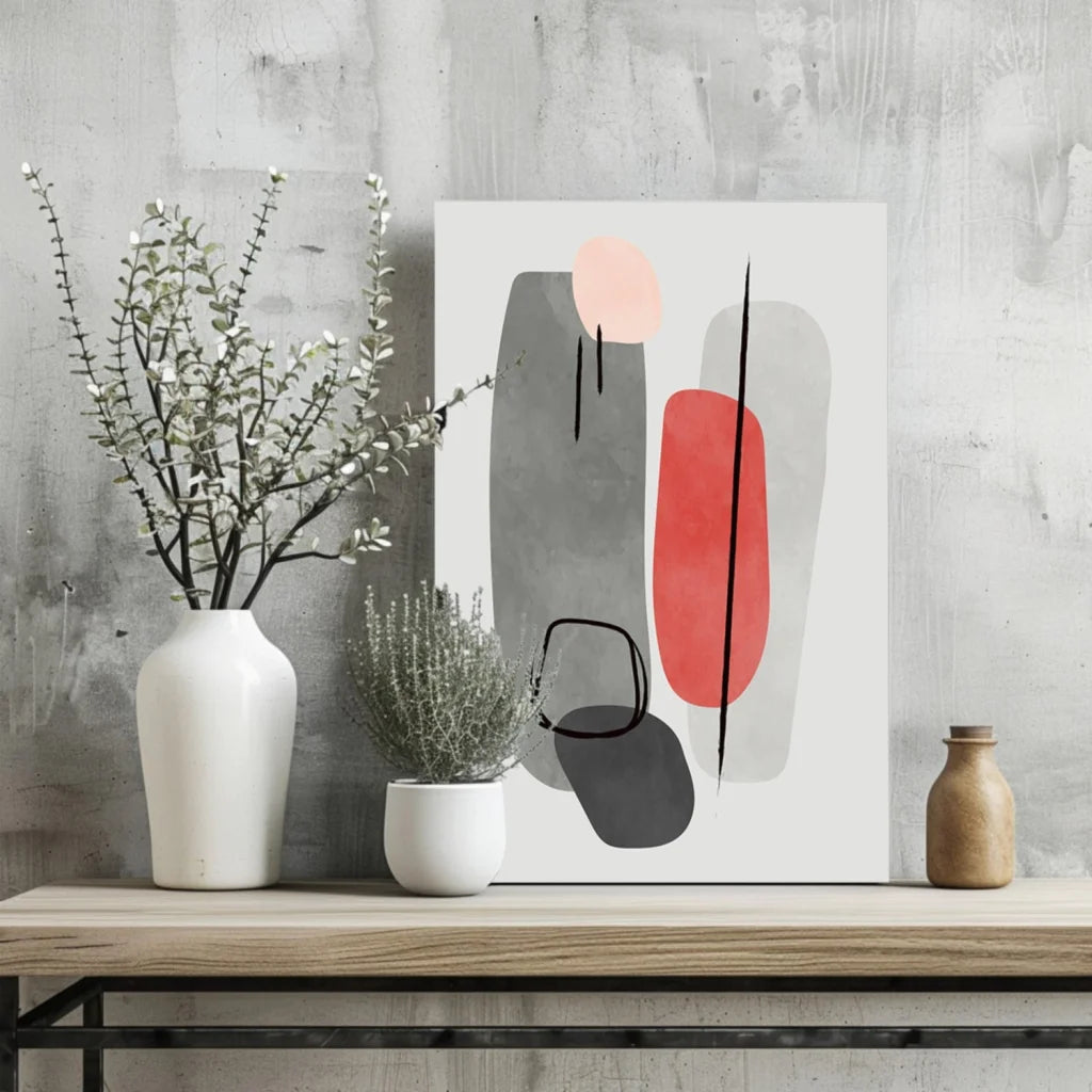 Bold red, gray, black geometric shapes on white in Insigne aluminum prints