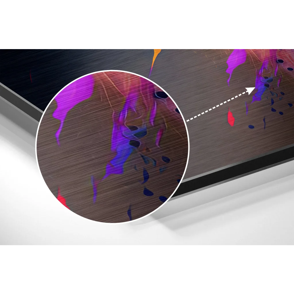 Vibrant brushed aluminium dibond wall art with bold purple and red paint splashes on dark wood-grain surface