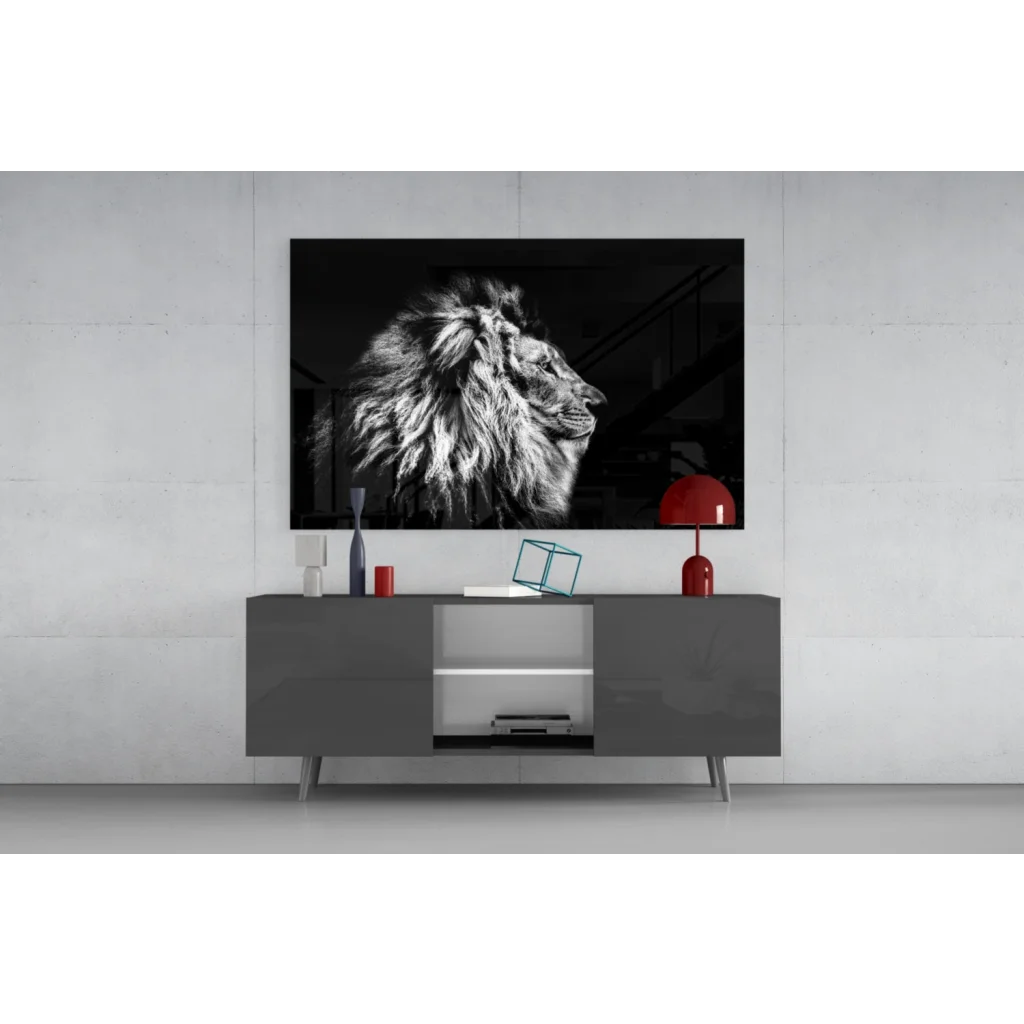 Black and white lion head wall art print mounted on wall