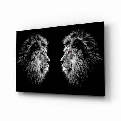 Fierce lions glass wall art with glowing red eyes on black canvas