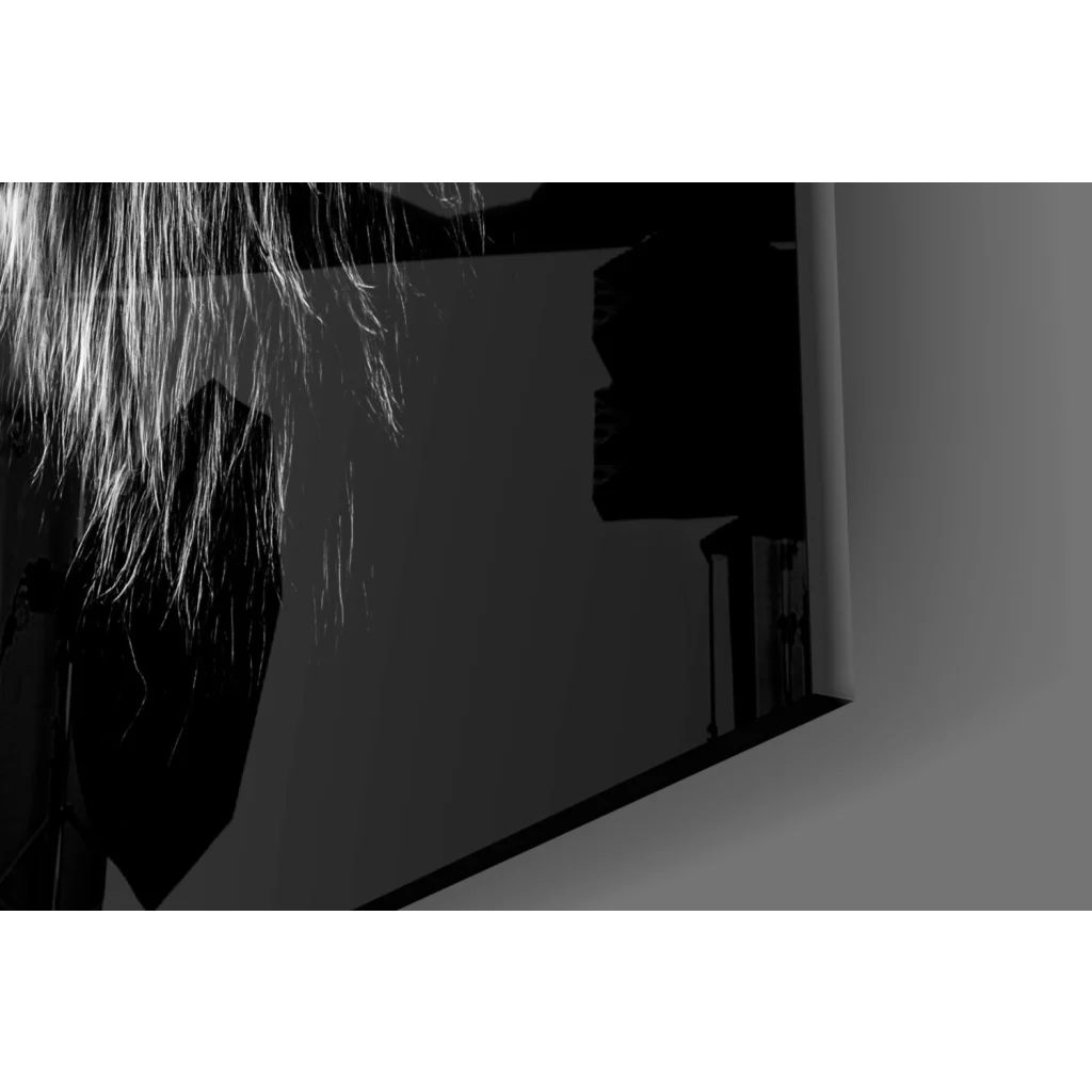 Fierce Lions glass wall art with glowing eyes in black and white studio setup