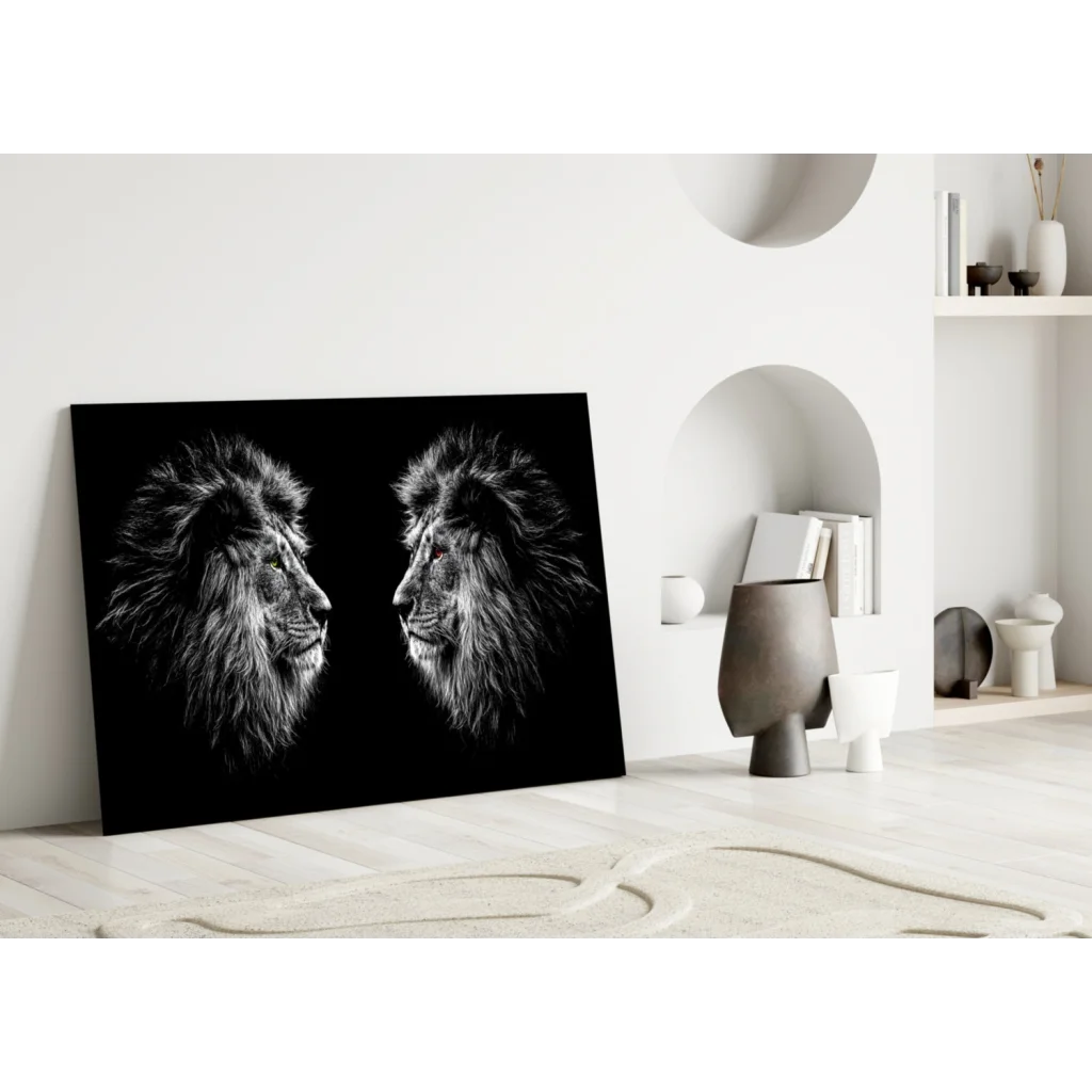 Fierce lions glass wall art with monochrome heads facing each other
