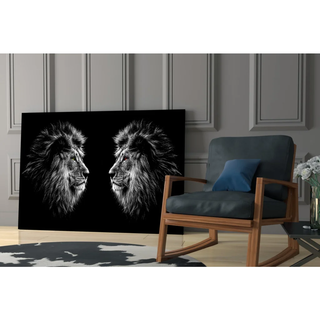 Fierce lions glass wall art with two monochrome heads facing each other
