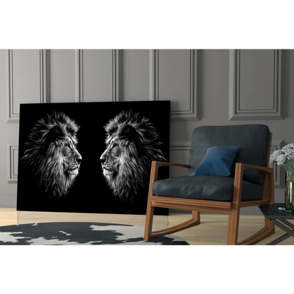 Fierce lions glass wall art with two monochrome heads facing each other