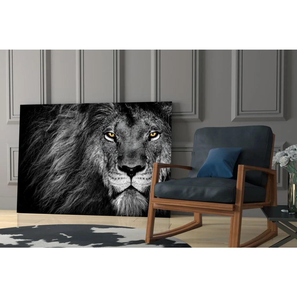 Black and white lion face canvas wall art with golden eyes