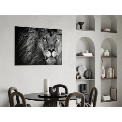 Black and white lion canvas wall art with golden eyes on wall