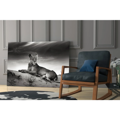 Majestic lioness black and white canvas wall art on rocky terrain