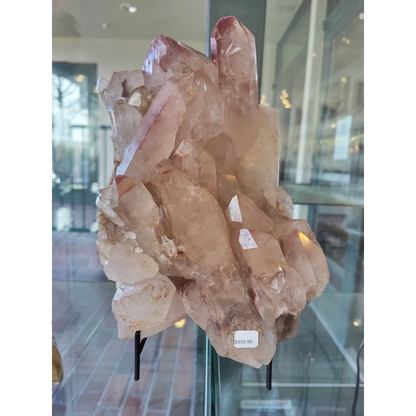 Lithium quartz cluster 7.55kg with translucent pinkish-brown sharp interlocking facets and rugged texture