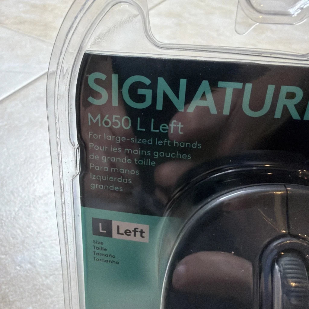 Logitech Signature M650 L Left wireless mouse in clear plastic packaging