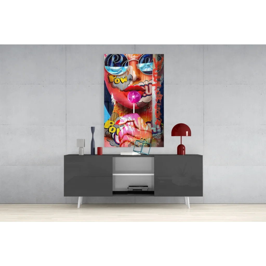 Vibrant Pop Art Lollipop Girl glass wall art with bold blue sunglasses and pink lips