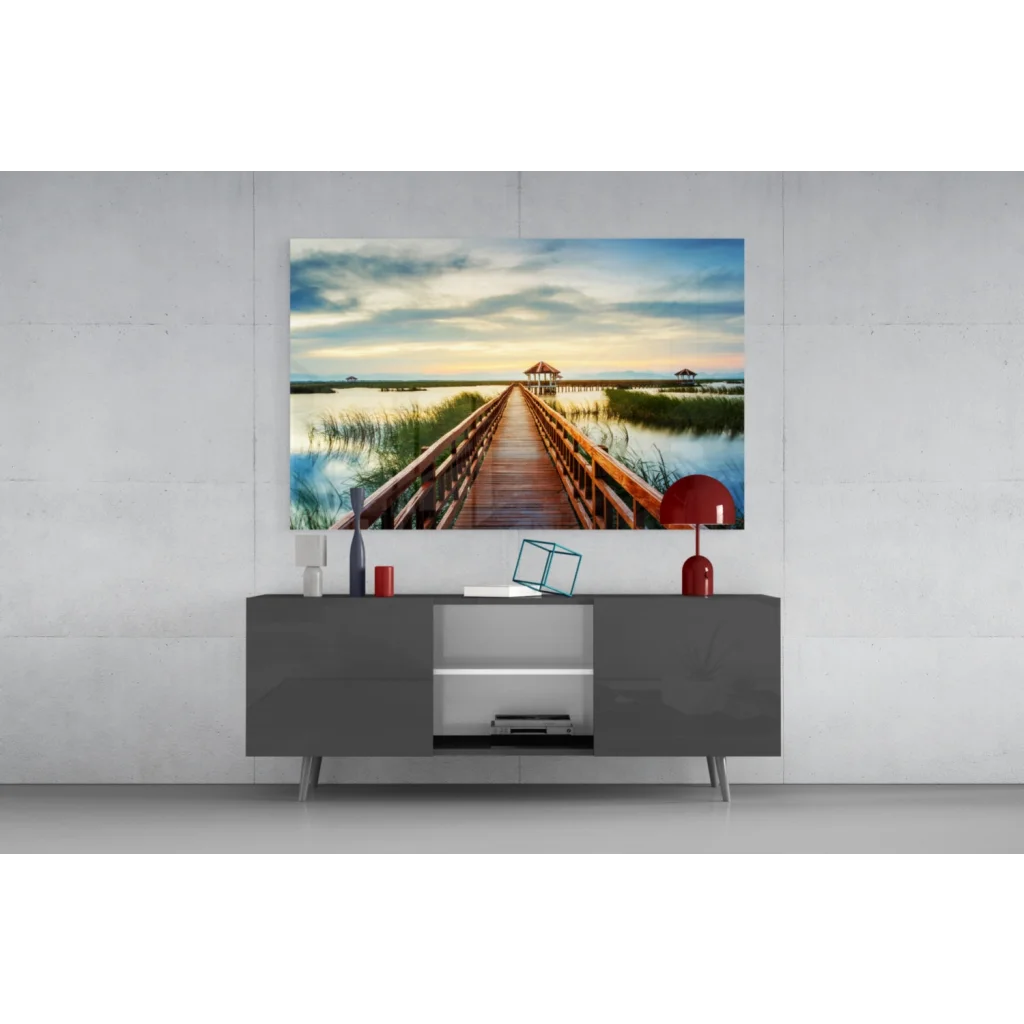 Tranquil boardwalk glass wall art over serene waters