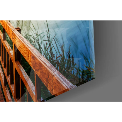 Glossy wooden bridge railing in warm brown tones on glass wall art