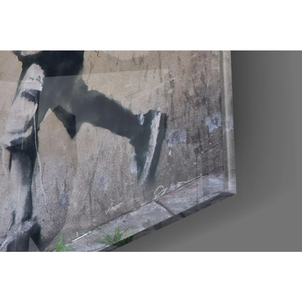 Banksy No Ball Games gray black graffiti on textured concrete wall art