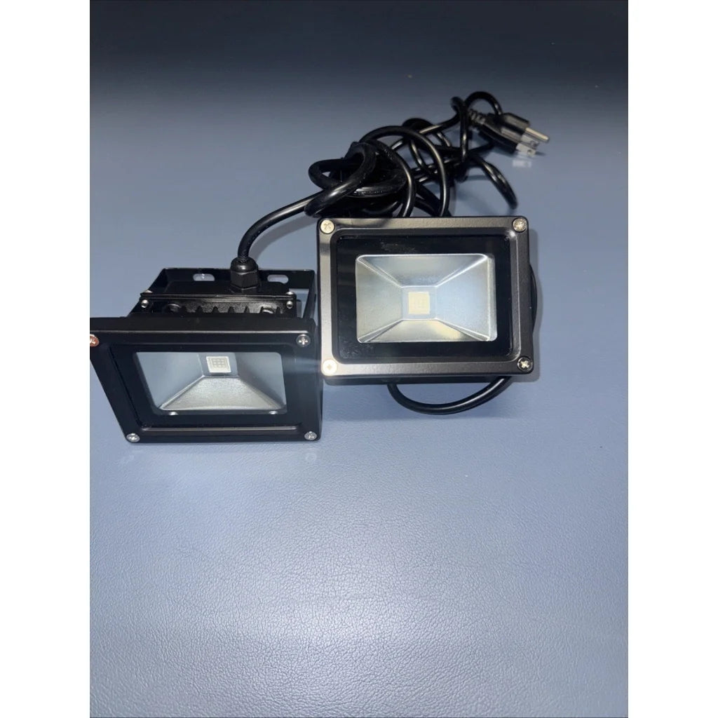 Black rectangular purple LED floodlight with clear lens on power supply unit
