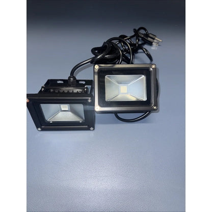 Black rectangular purple LED floodlight with clear lens on power supply unit