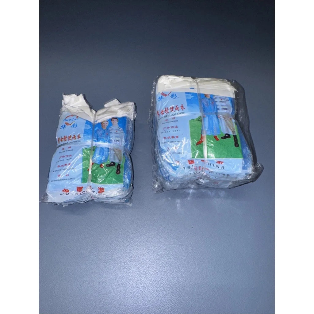Two packs of waterproof men light poncho in clear plastic wraps