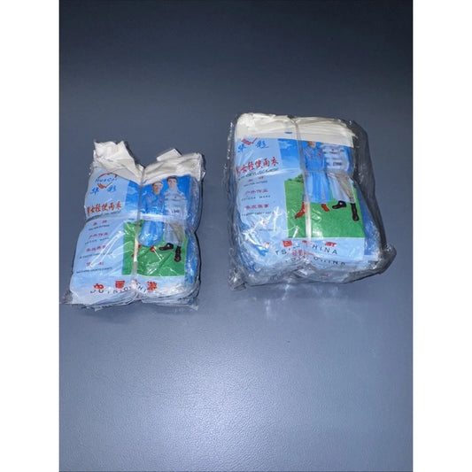 Two packs of waterproof men light poncho in clear plastic wraps