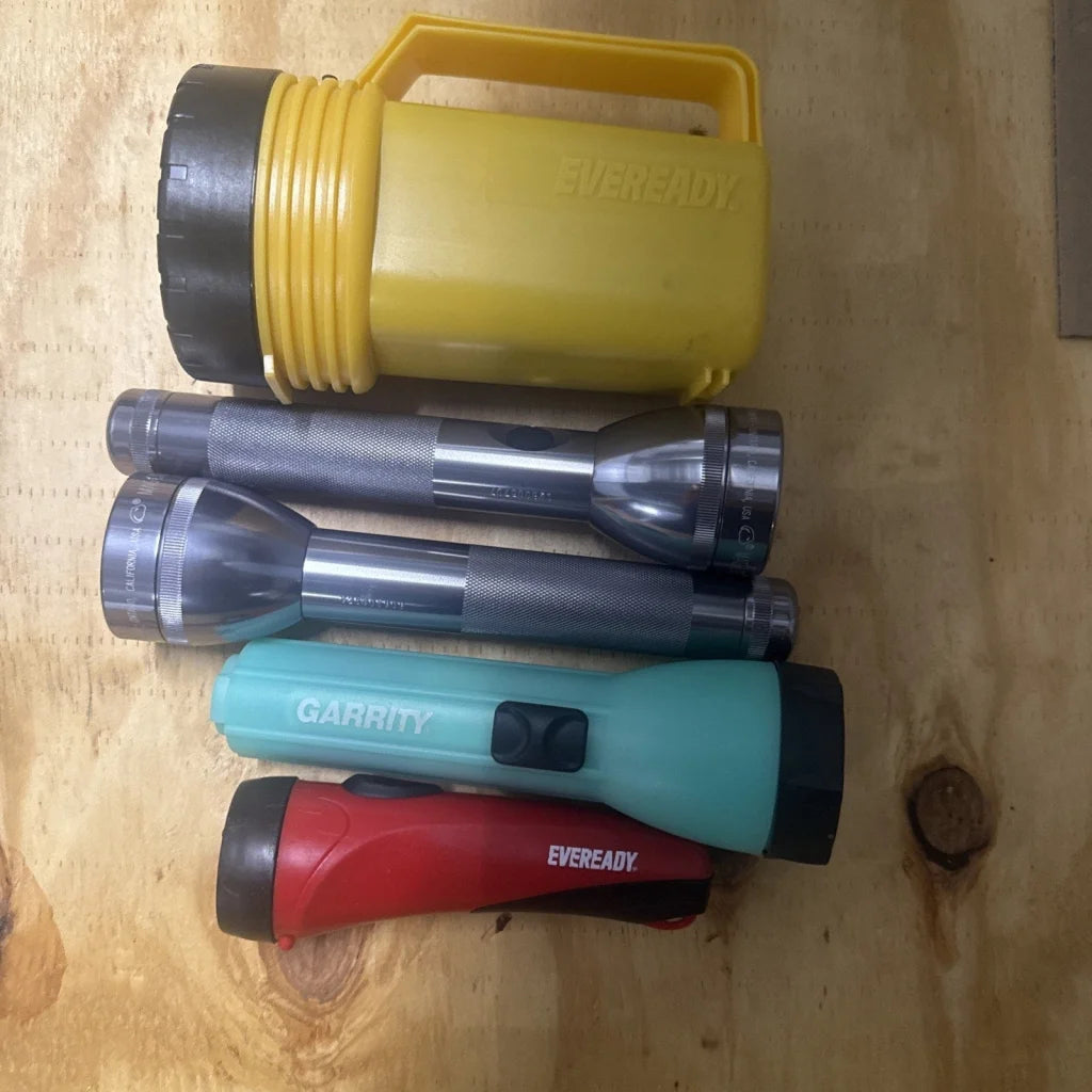 Yellow Eveready vintage flashlight maglite style black grip handle