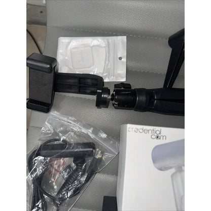 Black plastic car mount with adjustable clamp in lot offers of tripods
